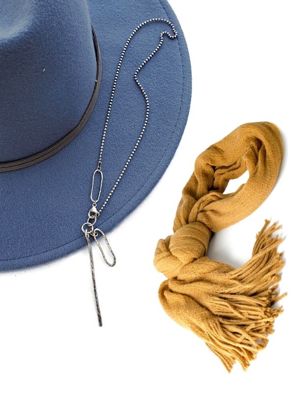 silver necklace blue hat & scarf