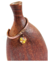 Copper-Swarovski-crystal-heart-cuff-on-brown-handthrown-pottery-vasr