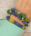 aromathrapy-blue-and-green-gemstone-stack-set-on-wrist