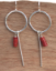 sterling coral earrings on wood