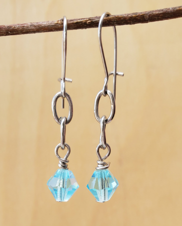 aqua crystal earrings on branch