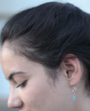 petite aqua crystal earring on female profile