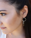sterling hoop stick earring on female profile