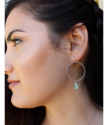 light Blue gemstone on sterling hoop earring on female