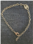 hypoallergenic chain tag anklet on denim