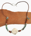 white wood turquoise leather necklace  with sterling clasp on wood