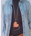 layered copper heart necklaces with denim outfit