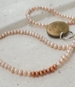 Two tone peach pearl  necklace with German Coin necklace