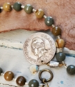 Tahiti coin jewelry close up
