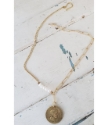 full view mixed gold chain pearl coin necklace on white wood