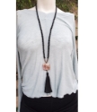black gemstone tassel necklace on mannequin