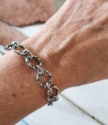 Silver circles bracelet on wrist
