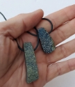 in hand 2 druzy stone necklaces