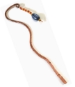 Hammered copper blue, yellow red beaded book mark in book