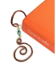 Artisan copper spiral blue and green crystal book mark in book