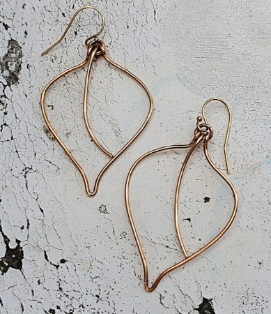 small/medium bronze leaf earrings on white