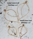 comparison chart of loose leaf earring on white distressed wood
