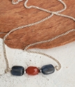 Blue orange gemstone silver chain necklace on wood