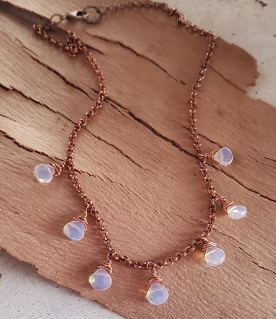 opalite stone copper chain necklace on wood