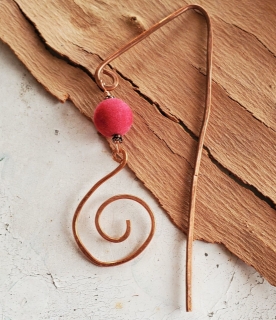 copper spiral book mark with pink pom-pom