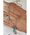 Silver Peace charm turquoise silver chain necklace on table