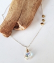 Swarovski crystal heart gold pearl silver chain necklace on wood
