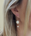 white pearl double drop earrings on model