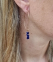  bronze hoop blue gemstone earring on female