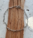 silver chain back toggle necklace on wood