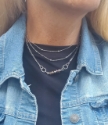 silver chain & crystal bar modern necklace s on model in denim
