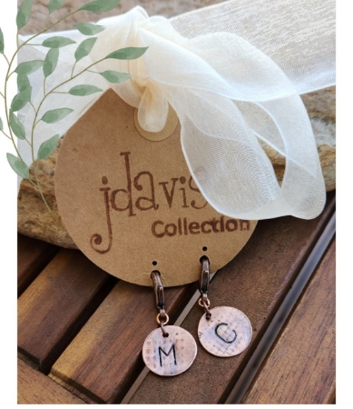 Copper initial charms on round tag