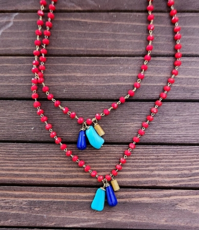 red crystal chain, blue & turquoise dainty gemstone necklaces on wood