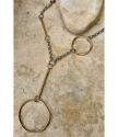 mixed metal bar chain necklace close up on stone