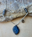 blue labradorite pendant, smokey quartz, silver v necklace close up