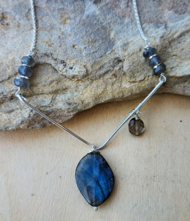 blue labradorite pendant, smokey quartz, silver v necklace close up