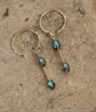 gold mini hoop green yellow crystal earrings on rock