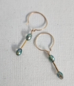 gold mini hoop green yellow crystal earrings on white background