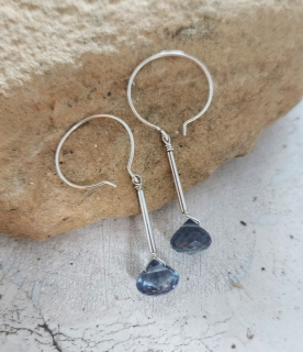 silver mini hoop lavender topaz earrings on rock