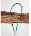 full view turquoise sunstone rainbow quartz toggle necklace on wood