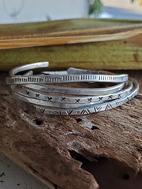 sterling silver cuffs in a stack
