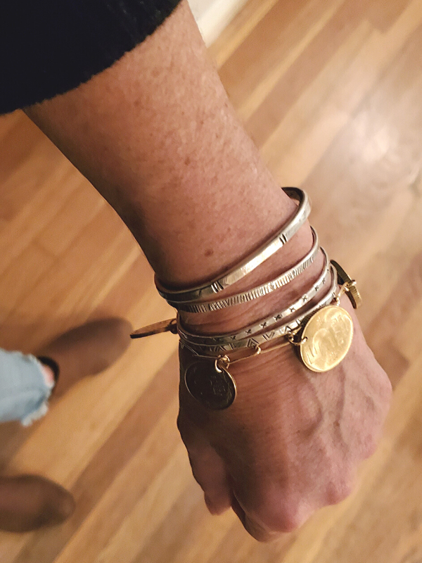 mixed metal bracelet stack on arm