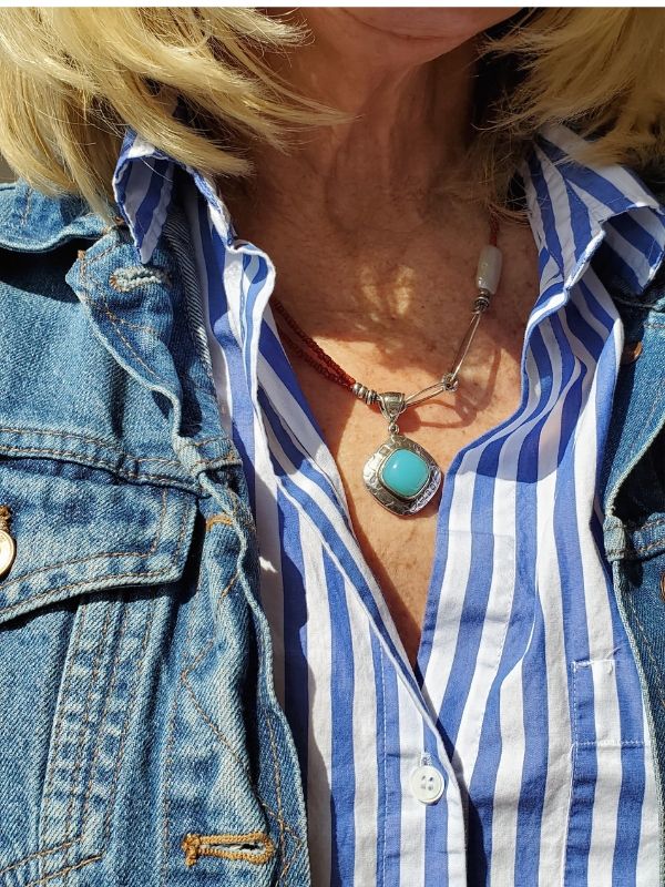 artisan gemstone necklace worn in casual outfit
