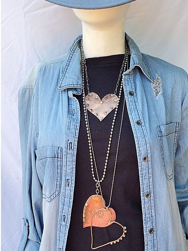 layered necklaces with denim outfit
