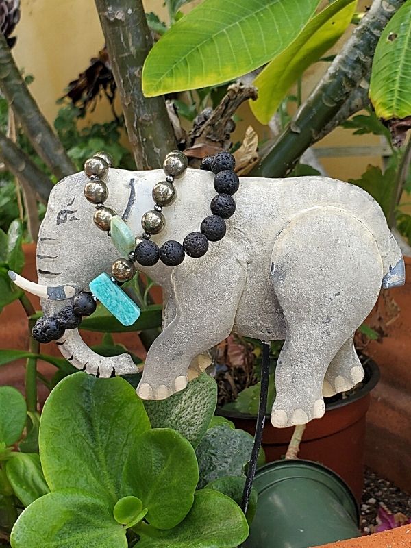 aromatherapy bracelets on an elephant in garden