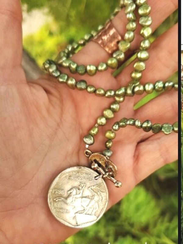 in hand green pearl Portugese coin necklace
