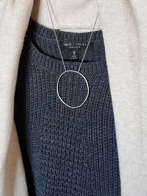 sweater with sweater dress and big open circle necklace