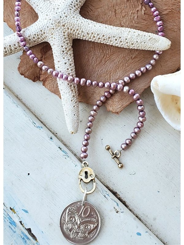 Purple pearl NZ coin necklace with a starfish