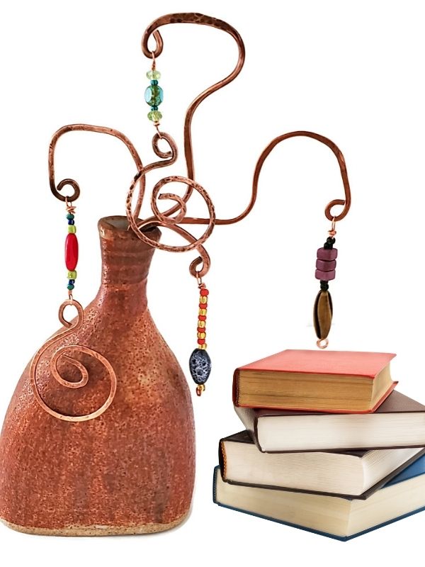 copper colorful beaded book marks in vase