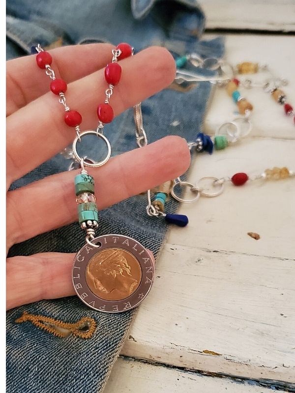 Holding a gemstone Italian Coin necklace