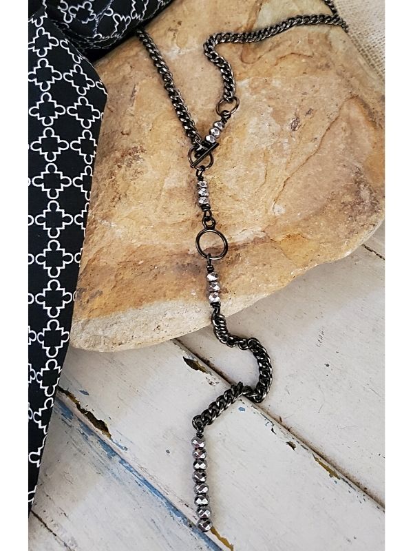 black gunmetal chain necklace with black pants